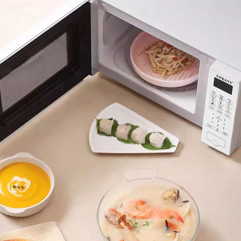 Interior of open SOKANY microwave with food